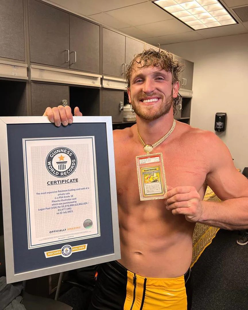 Logan Paul at his WWE debut wearing the Pikachu Illustrator PSA 10 alongside the Guinness World Record