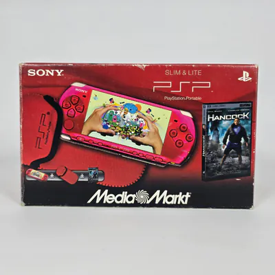PSP 3004 Slim & Lite Radiand Red - Media Markt Exclusive Pack Hancock UMD Movie & Buzz! case (Spain)